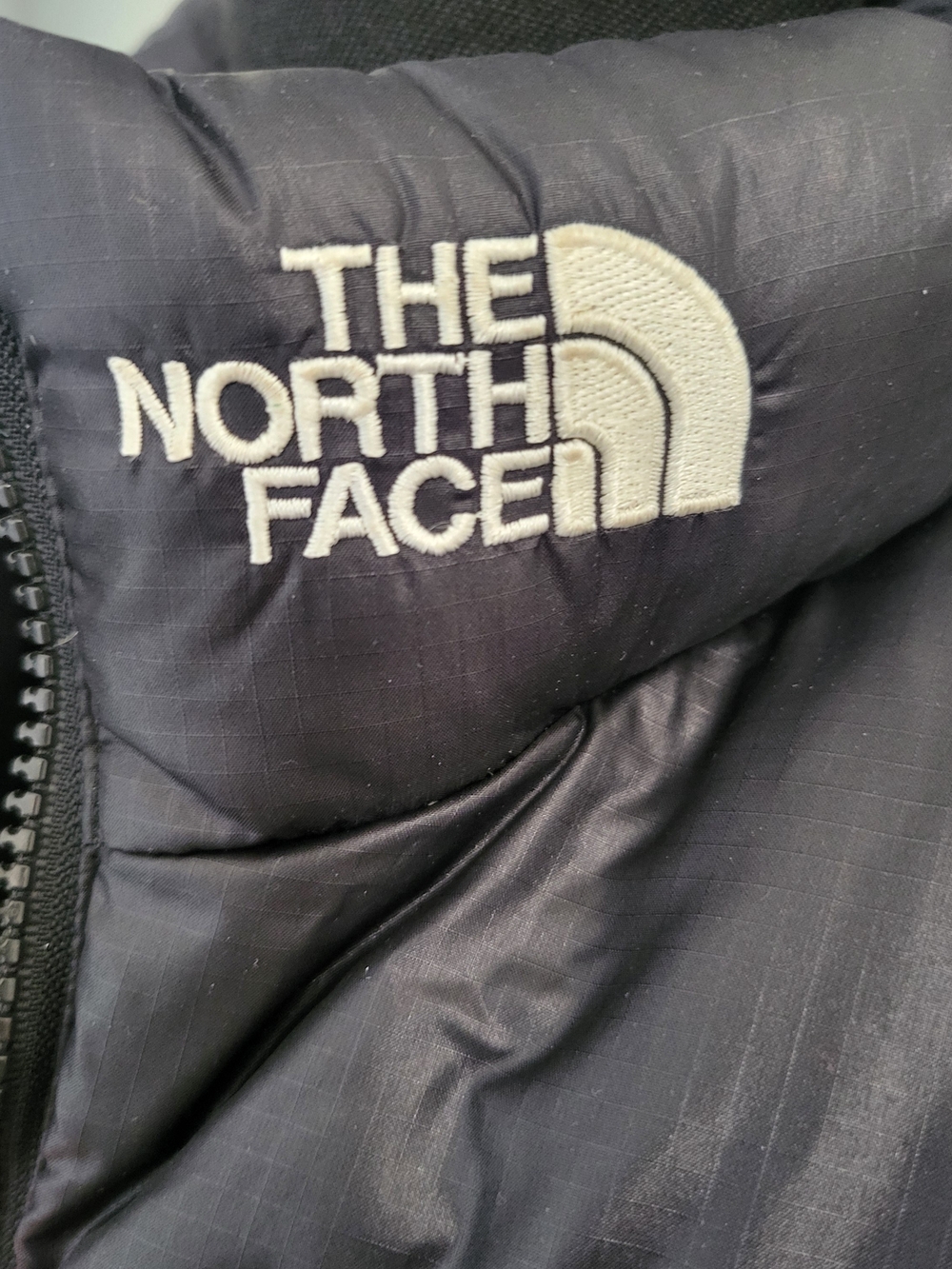 The North Face Black Jacket with White Logo